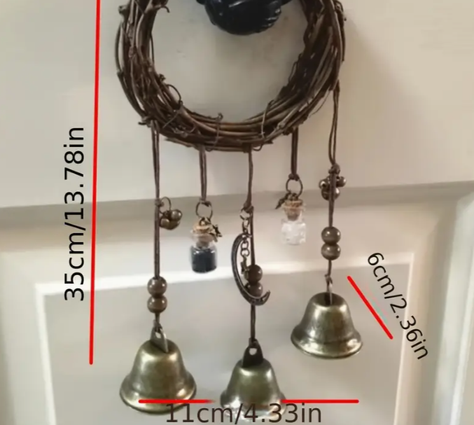 Decorative wall hanging with bells and measurements on a white background