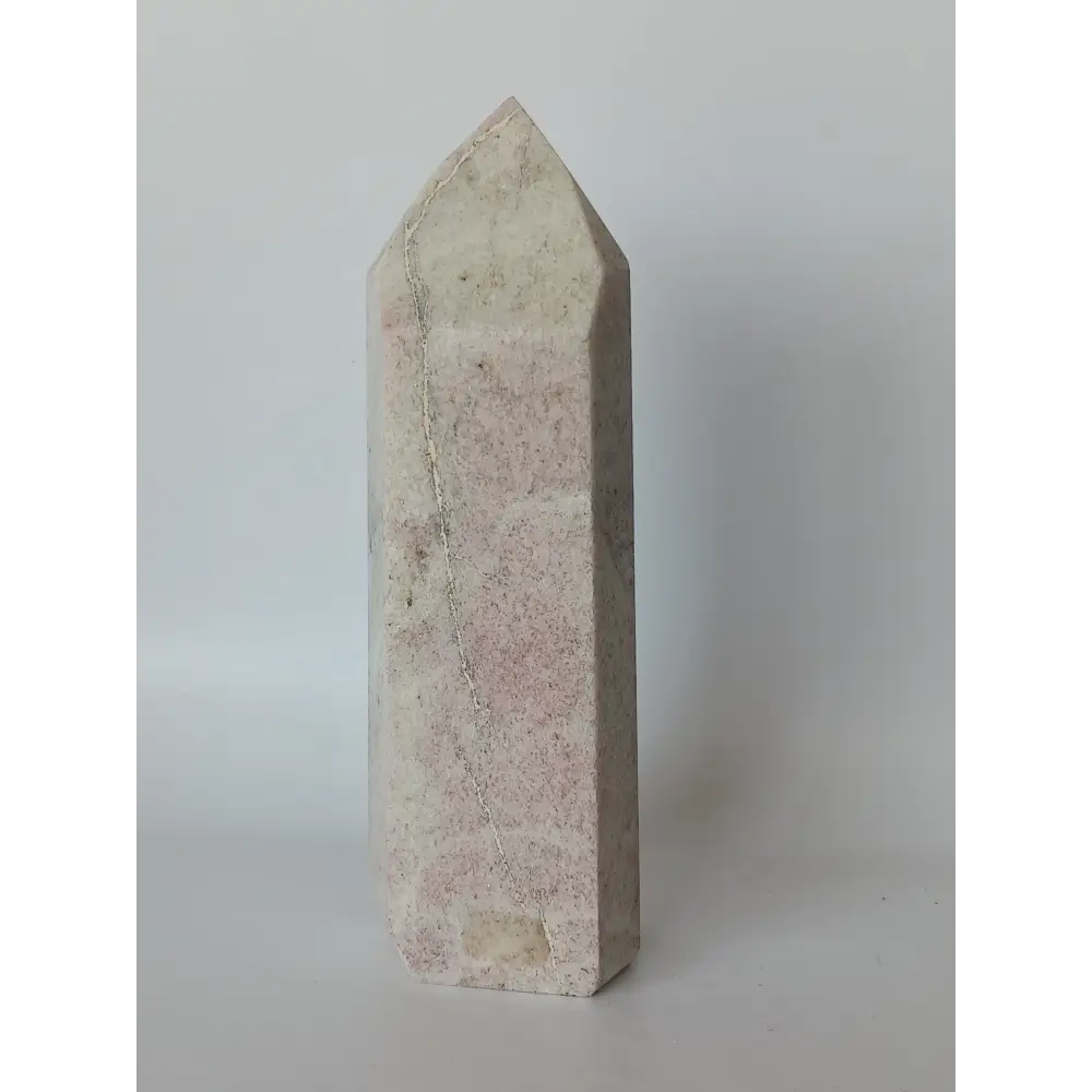 Hand-carved Albite Mica tower featuring radiant white albite with shimmering mica inclusions, displayed on a white background.