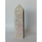 Hand-carved Albite Mica tower featuring radiant white albite with shimmering mica inclusions, displayed on a white background.