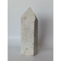 Hand-carved Albite Mica tower featuring radiant white albite with shimmering mica inclusions, displayed on a white background.