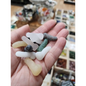 Assorted 1 inch penis-shaped crystal carvings in various colors and stones, hand-carved and displayed on a white background. Perfect for playful energy, empowerment, and root chakra healing.