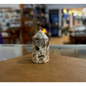 Hand-carved Mexican Crazy Lace Agate tower featuring intricate, colorful swirls and banded patterns, displayed on a white background.