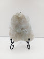 Fine glittery amethyst specimen, featuring sparkling purple points and a shimmering surface, displayed on a white background.