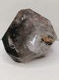 Faceted crystal on a white background