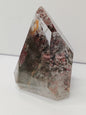 Hexagonal crystal with multicolored patterns on a white background