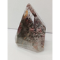 Hexagonal crystal with multicolored patterns on a white background