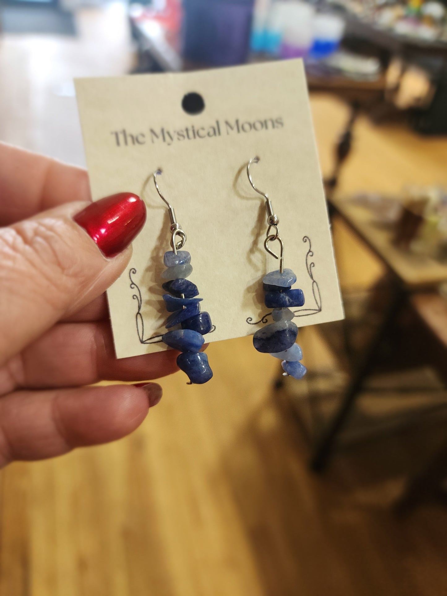 Assorted genuine stone chip earrings in a variety of colors and crystal types, displayed on a white background. Perfect for unique style and everyday crystal energy.