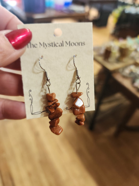Assorted genuine stone chip earrings in a variety of colors and crystal types, displayed on a white background. Perfect for unique style and everyday crystal energy.