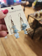 Assorted genuine stone chip earrings in a variety of colors and crystal types, displayed on a white background. Perfect for unique style and everyday crystal energy.
