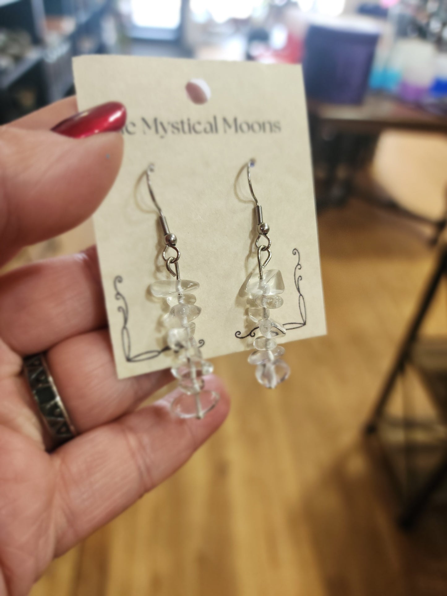 Assorted genuine stone chip earrings in a variety of colors and crystal types, displayed on a white background. Perfect for unique style and everyday crystal energy.