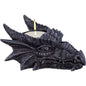 Grey dragon head t-light holder with a fierce, steely gaze, displayed with a tealight candle on a white background.