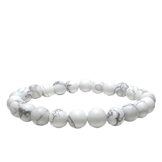 White marbled beaded bracelet on a light gray background