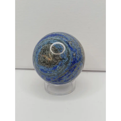 Decorative knob with blue and gray pattern on a white background