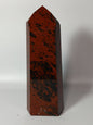 Hand-carved Mahogany Obsidian tower with rich brown and black swirls, displayed on a white background.