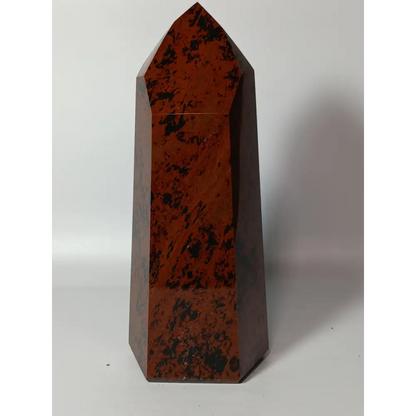 Hand-carved Mahogany Obsidian tower with rich brown and black swirls, displayed on a white background.