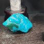 Malachite and chrysocolla specimen with vibrant green bands and blue-teal hues, displayed on a white background. Perfect for transformation, heart healing, and inner wisdom.
