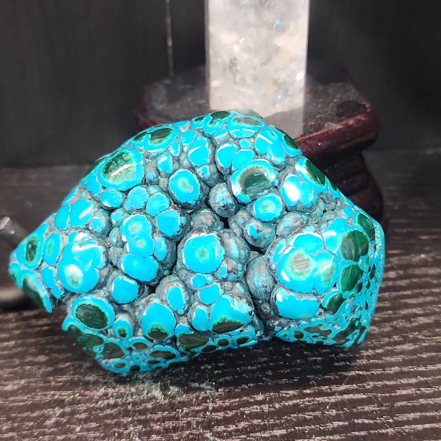Malachite and chrysocolla specimen with vibrant green bands and blue-teal hues, displayed on a white background. Perfect for transformation, heart healing, and inner wisdom.