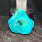 Malachite and chrysocolla specimen with vibrant green bands and blue-teal hues, displayed on a white background. Perfect for transformation, heart healing, and inner wisdom.