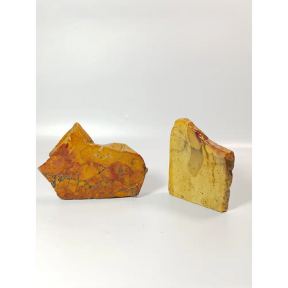 Hand-polished Mookaite slab, 2–2.5 inches, with vibrant red, yellow, and cream patterns, displayed on a white background.