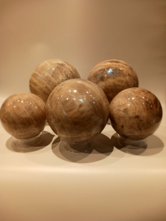 Moonstone with Sunstone sphere for harmony and empowerment