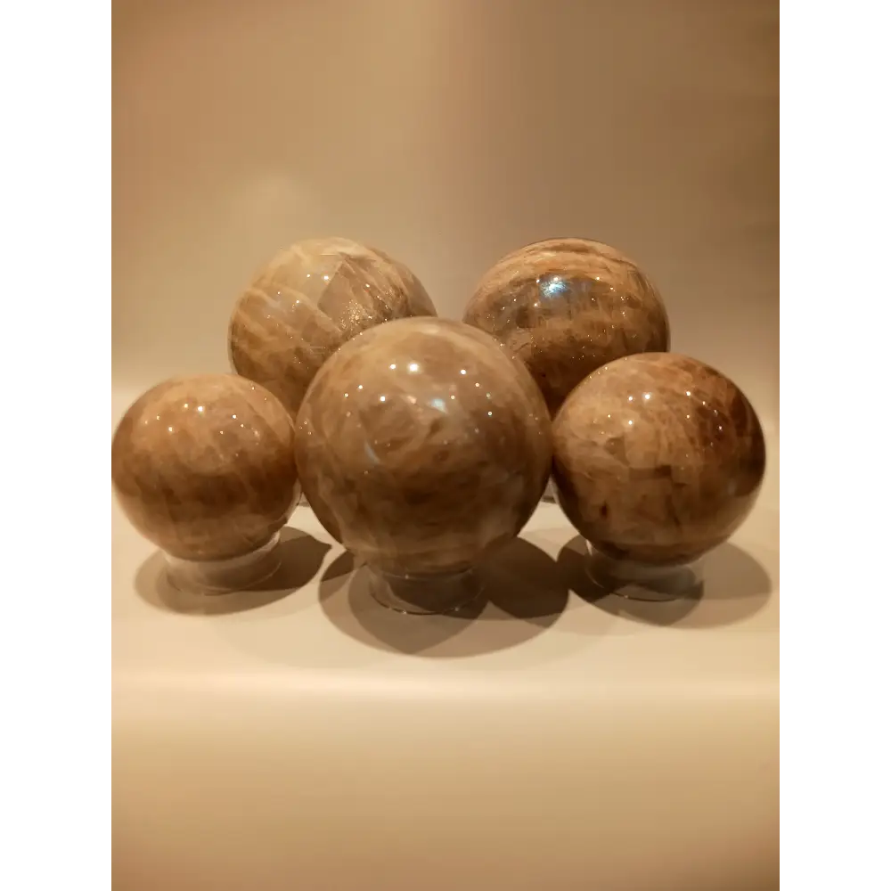 Moonstone with Sunstone sphere for harmony and empowerment