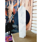 Diamantina clear quartz tower, 17 inches tall, polished with exceptional clarity and natural inclusions, displayed on a white background.