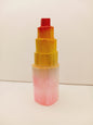 Rainbow selenite tiered tower, polished with a vibrant rainbow sheen and step-like design, displayed on a white background.