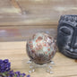 Hand-polished RARE Green Sakura Flower Agate featuring lush green tones and delicate, flower-like patterns reminiscent of cherry blossoms, displayed on a white background.