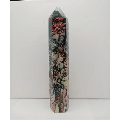 Marbled stone crystal on a white background