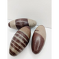 Shiva Lingam stones, polished with natural earthy patterns, available in sizes 1" to 8", displayed on a white background.