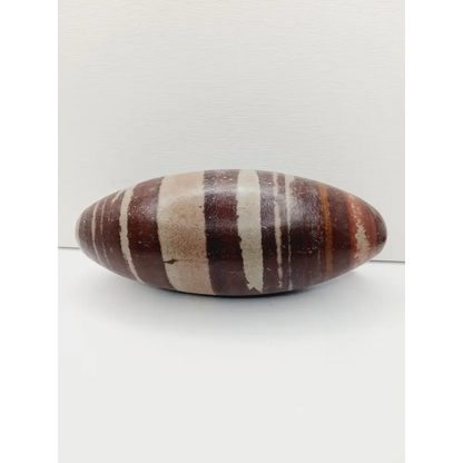 Shiva Lingam stones, polished with natural earthy patterns, available in sizes 1" to 8", displayed on a white background.