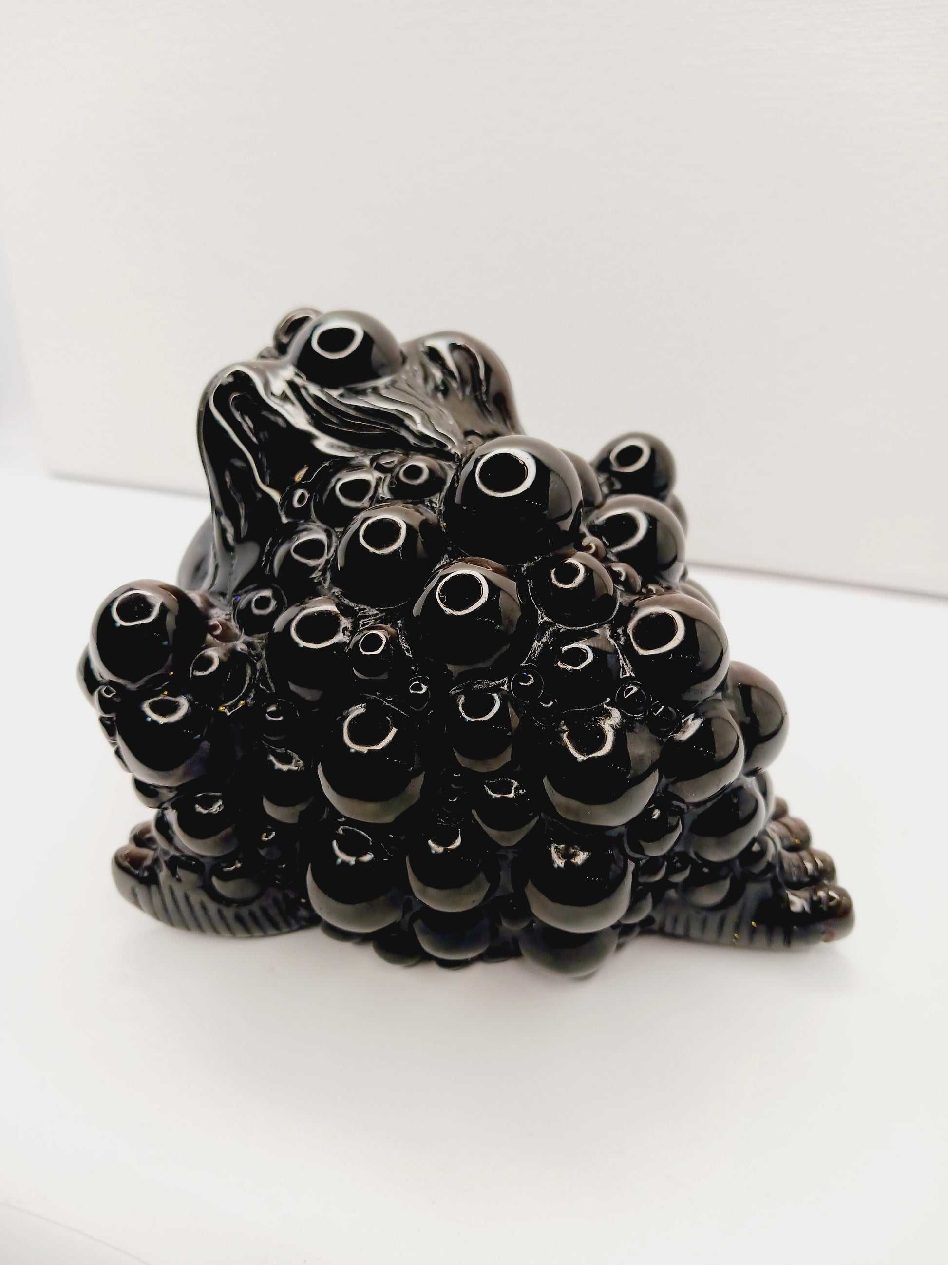 Silver sheen obsidian money toad, hand-carved with a reflective silver luster, measuring 5.5 inches, displayed on a white background.