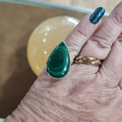 Assorted sterling silver rings featuring unique genuine gemstones in various shapes and colors, displayed on a white background. Perfect for crystal energy, personal style, and one-of-a-kind magic.

