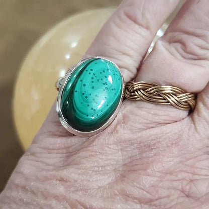 Assorted sterling silver rings featuring unique genuine gemstones in various shapes and colors, displayed on a white background. Perfect for crystal energy, personal style, and one-of-a-kind magic.

