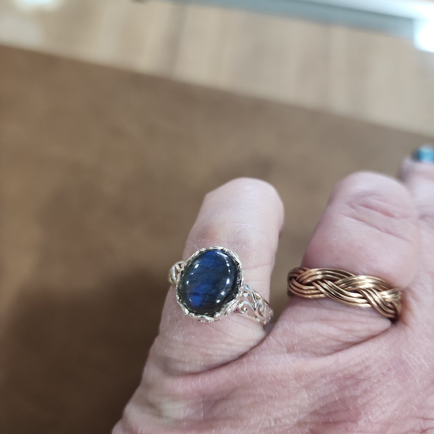 Assorted sterling silver rings featuring unique genuine gemstones in various shapes and colors, displayed on a white background. Perfect for crystal energy, personal style, and one-of-a-kind magic.