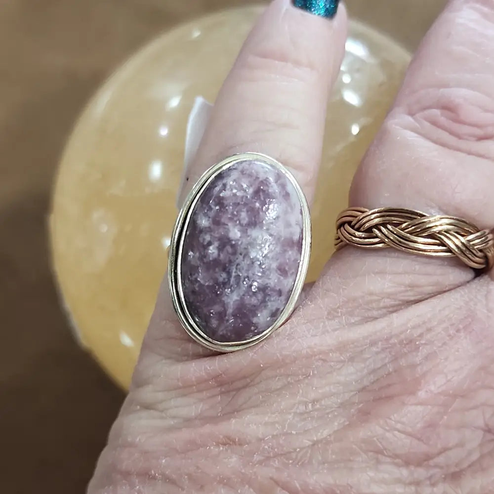 Assorted sterling silver rings featuring unique genuine gemstones in various shapes and colors, displayed on a white background. Perfect for crystal energy, personal style, and one-of-a-kind magic.

