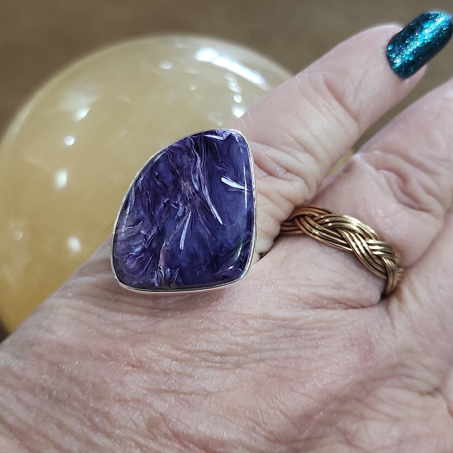 Assorted sterling silver rings featuring unique genuine gemstones in various shapes and colors, displayed on a white background. Perfect for crystal energy, personal style, and one-of-a-kind magic.

