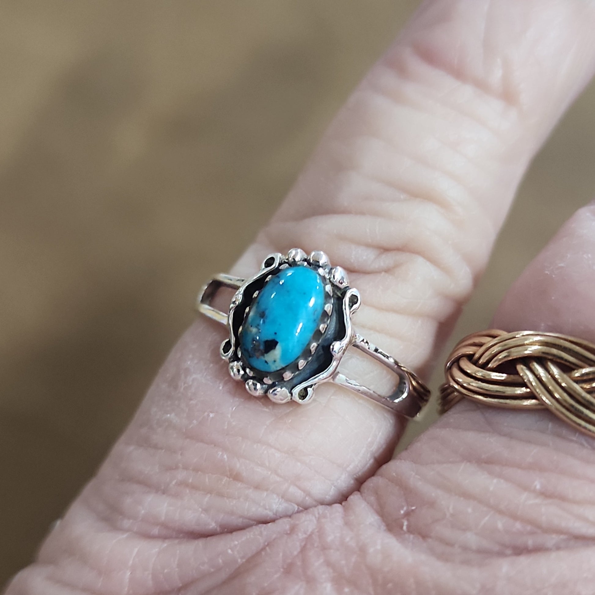 Assorted sterling silver rings featuring unique genuine gemstones in various shapes and colors, displayed on a white background. Perfect for crystal energy, personal style, and one-of-a-kind magic.