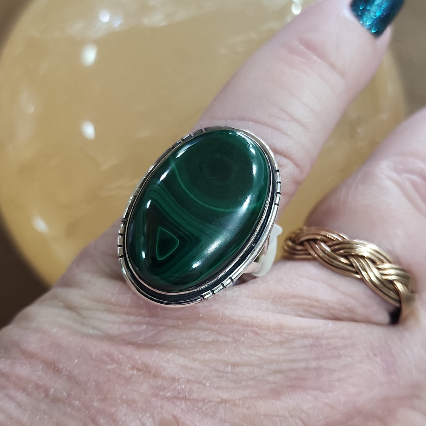Assorted sterling silver rings featuring unique genuine gemstones in various shapes and colors, displayed on a white background. Perfect for crystal energy, personal style, and one-of-a-kind magic.

