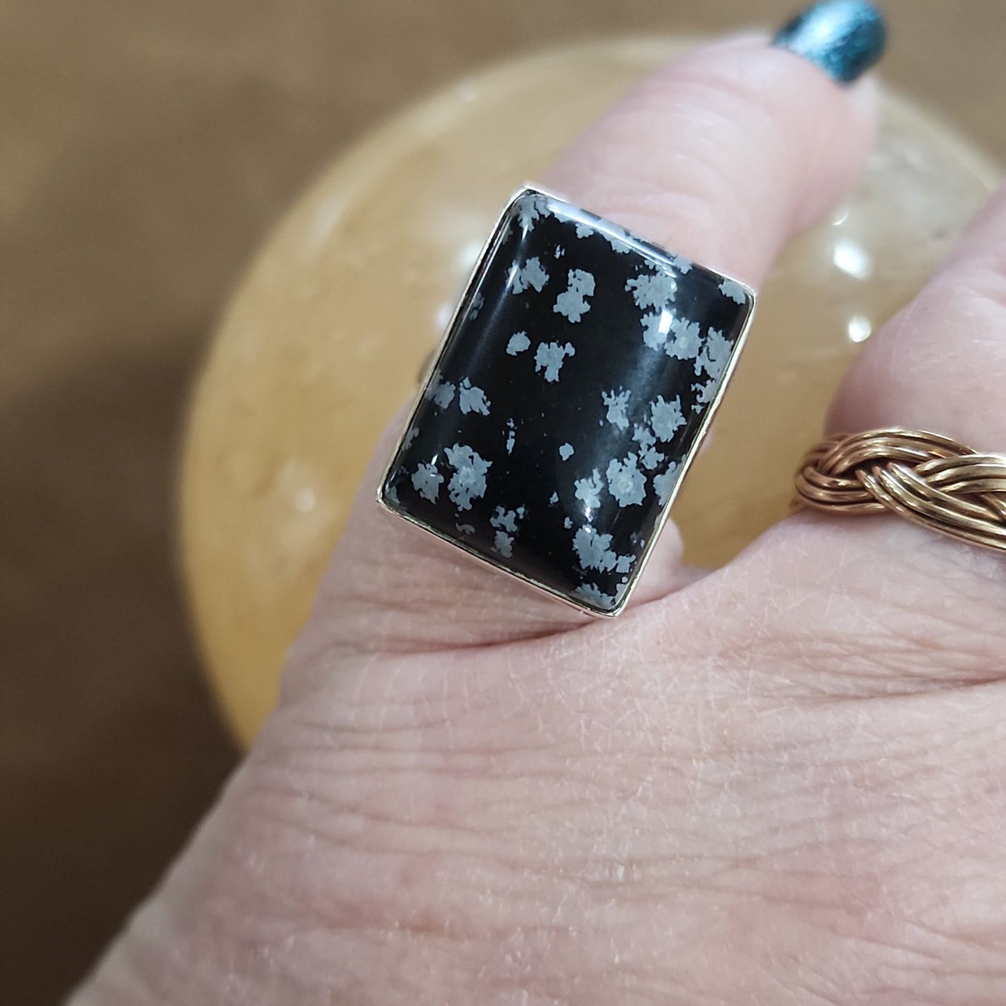 Assorted sterling silver rings featuring unique genuine gemstones in various shapes and colors, displayed on a white background. Perfect for crystal energy, personal style, and one-of-a-kind magic.

