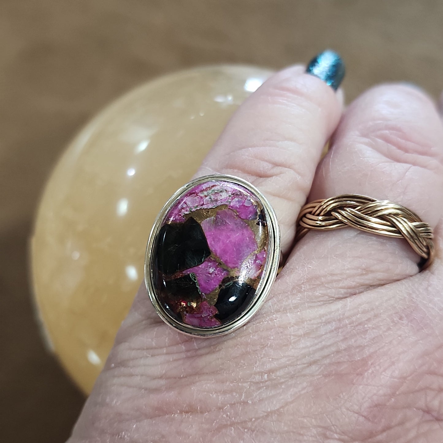 Assorted sterling silver rings featuring unique genuine gemstones in various shapes and colors, displayed on a white background. Perfect for crystal energy, personal style, and one-of-a-kind magic.

