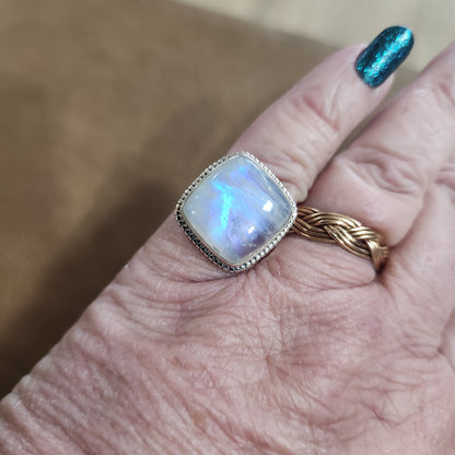 Assorted sterling silver rings featuring unique genuine gemstones in various shapes and colors, displayed on a white background. Perfect for crystal energy, personal style, and one-of-a-kind magic.