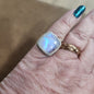 Assorted sterling silver rings featuring unique genuine gemstones in various shapes and colors, displayed on a white background. Perfect for crystal energy, personal style, and one-of-a-kind magic.