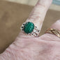 Assorted sterling silver rings featuring unique genuine gemstones in various shapes and colors, displayed on a white background. Perfect for crystal energy, personal style, and one-of-a-kind magic.