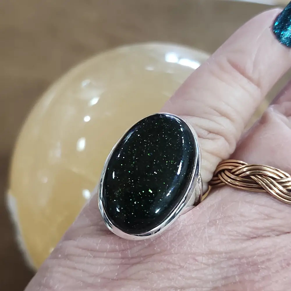 Assorted sterling silver rings featuring unique genuine gemstones in various shapes and colors, displayed on a white background. Perfect for crystal energy, personal style, and one-of-a-kind magic.

