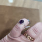 Assorted sterling silver rings featuring unique genuine gemstones in various shapes and colors, displayed on a white background. Perfect for crystal energy, personal style, and one-of-a-kind magic.