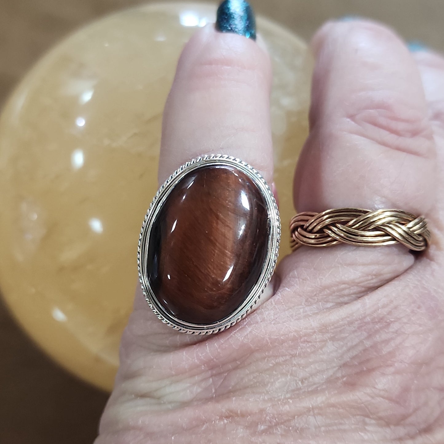 Assorted sterling silver rings featuring unique genuine gemstones in various shapes and colors, displayed on a white background. Perfect for crystal energy, personal style, and one-of-a-kind magic.

