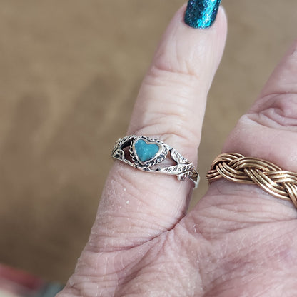 Assorted sterling silver rings featuring unique genuine gemstones in various shapes and colors, displayed on a white background. Perfect for crystal energy, personal style, and one-of-a-kind magic.