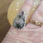 Assorted sterling silver rings featuring unique genuine gemstones in various shapes and colors, displayed on a white background. Perfect for crystal energy, personal style, and one-of-a-kind magic.


