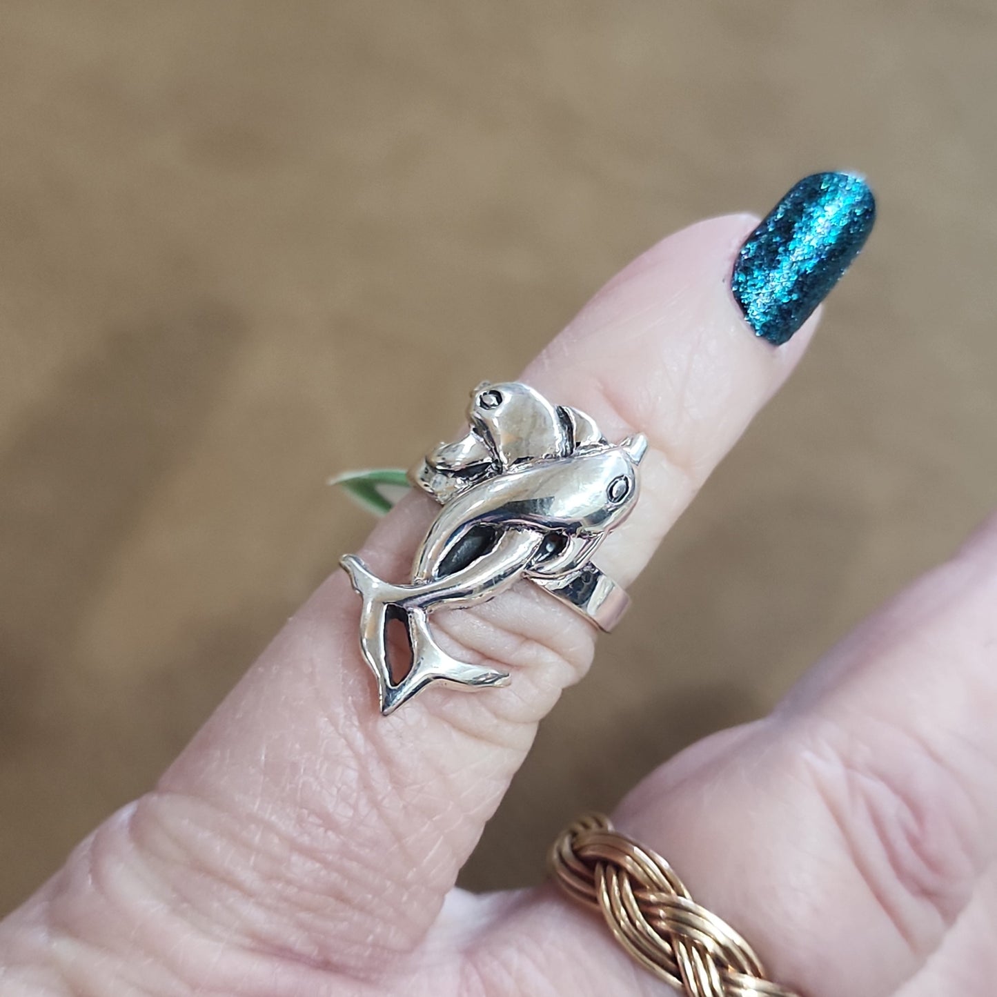 Assorted sterling silver rings featuring unique genuine gemstones in various shapes and colors, displayed on a white background. Perfect for crystal energy, personal style, and one-of-a-kind magic.